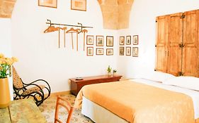 Sacre Bleu Apartments